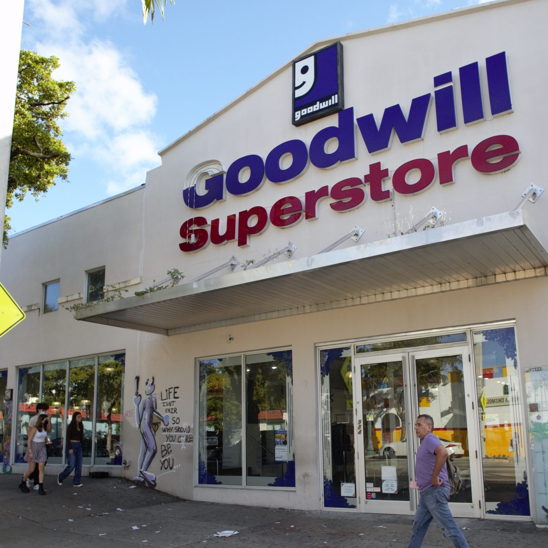 Goodwill Superstore signboard logo and lettering on the façade of a building